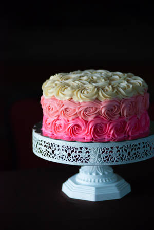 Captivating Pink And White Rosette Cake Wallpaper