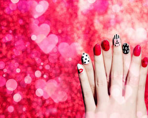 Captivating Red And Black Nail Art Design Wallpaper