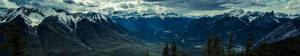 Capture The Beauty Of Nature With This Amazing 5760x1080 Panoramic View Of A Majestic Mountain Landscape Wallpaper