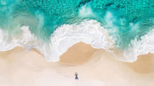 Capture The Beauty Of The Deep Blue Ocean Wallpaper