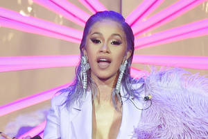 Cardi B Purple Feathers Wallpaper