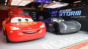 Cars 3 Lightning And Jackson Display Wallpaper