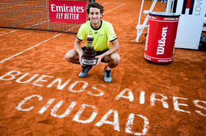 Casper Ruud Holding Atp Tour Trophy Wallpaper