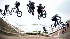 Catch The Thrill Of Bmx Biking With A 360⁰ Flip! Wallpaper