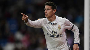 Cautious Soccer Legend James Rodriguez Wallpaper