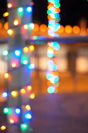 Celebrate Christmas Night Amidst The Tranquil Beauty Of A Winter Landscape Wallpaper