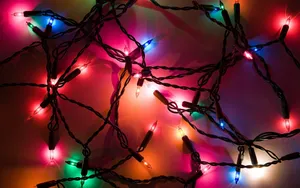 Celebrate The Holidays With Adorable Christmas Lights Wallpaper