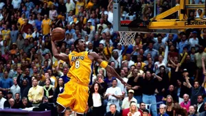 Celebrity Athlete Kobe Bryant With A Mobile Phone Wallpaper