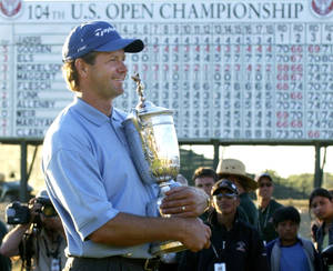 Champion Golfer Retief Goosen Embracing His Trophy Wallpaper