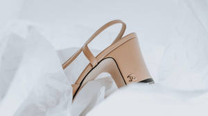 Chanel Beige Shoe Heel Logo Wallpaper