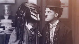 Charlie Chaplin In His Iconic Feature Film Role Wallpaper