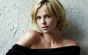 Charlize Theron In A Stylish Black Off-shoulder Outfit Wallpaper