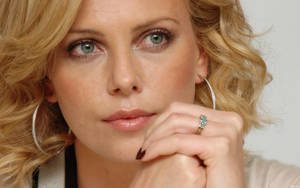 Charlize Theron In Statement Bangle Earrings Wallpaper
