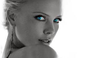 Charlize Theron’s Piercing Blue Eyes Wallpaper