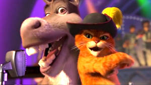 Charming Duo - Puss In Boots & Donkey In Shrek 2 Wallpaper