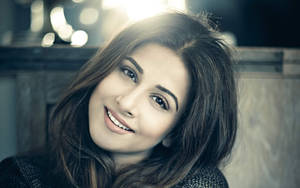 Charming Smile Of Vidya Balan Wallpaper