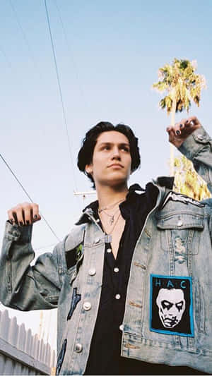 Chase Hudson Looking Cool In A Black And White Photoshoot Wallpaper