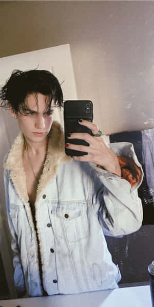 Chase Hudson Poses For A Picture Wallpaper