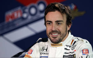 Cheerful Fernando Alonso Expressing Joy Wallpaper