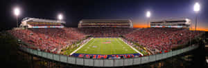 Cheering On The Rebels At The Ole Miss Stadium Wallpaper