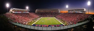 Cheering On The Rebels At The Ole Miss Stadium Wallpaper