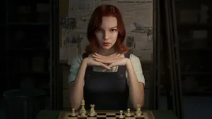 Chess Prodigy Beth Harmon Battling Her Opponents In The Queen's Gambit. Wallpaper