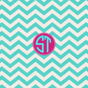 Chevron Pattern With A Monogram On It Wallpaper