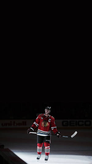 Chicago Blackhawks Captain, Jonathan Toews, In Action On The Ice. Wallpaper