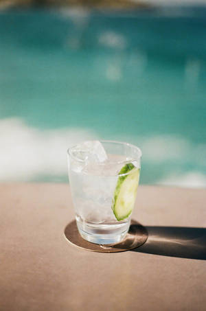 Chilled Gin With Sliced Cucumber Wallpaper