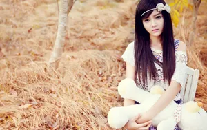 Chinese Girl With Teddy Bear Wallpaper
