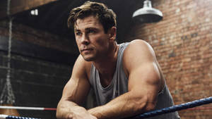 Chris Hemsworth Stay Fit And Motivated While At The Gym Wallpaper
