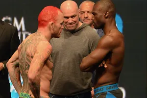Chris Leben Facing With Uriah Hall Wallpaper