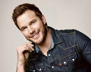 Chris Pratt Smiling In Denim Wallpaper