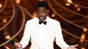 Chris Rock In White Tuxedo Wallpaper