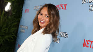 Chrissy Teigen Netflix Event Smile Wallpaper