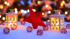 Christmas Lanterns And Decorations In The Snow Wallpaper