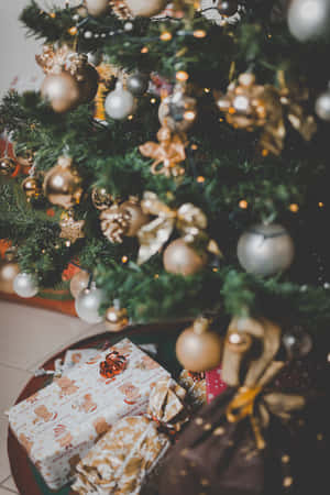 Christmas Tree With Presents Under It Wallpaper