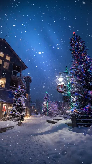 Christmas Tree With Snow Falling Wallpaper