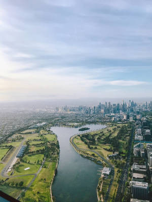 City Buildings With River View Wallpaper