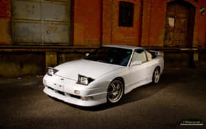 Classic Nissan Silvia S13 At The Racetrack Wallpaper