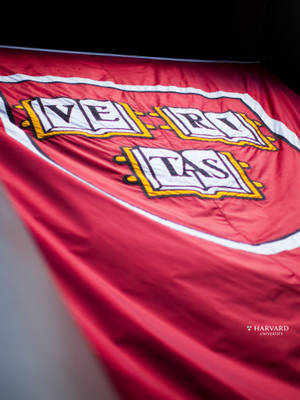 Classic View Of Harvard University Red Motto Wallpaper