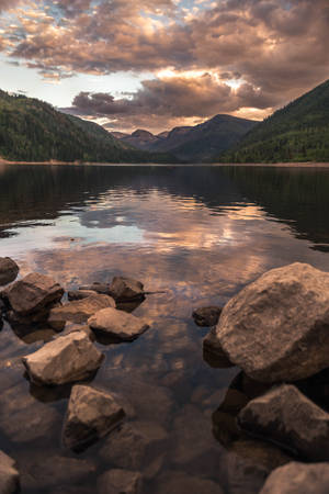 Clear Lake With Huge Rocks Wallpaper