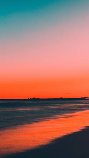 Clear Sunset Skies On Beach Wallpaper