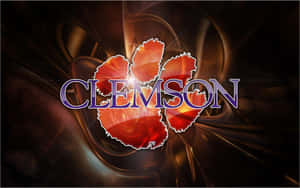 Clemson Tigers Football Logo In Orange With The Name Clemson Wallpaper