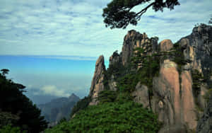 Cliff Mount Sanqing China Wallpaper