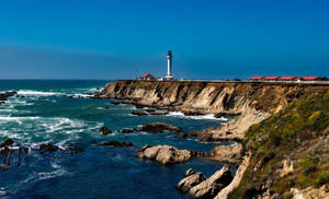 Cliff Side Lighthouse Wallpaper