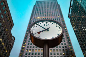 Clock And Buildings Wallpaper