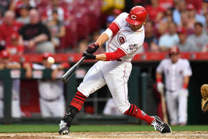 Close-up Of Joey Votto Hitting Baseball Wallpaper