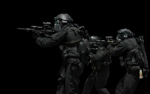 Close-up Of Swat Team Preparing For Mission Wallpaper