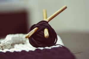 Close-up Shot Of Black Yarn Skein For Knitting Wallpaper